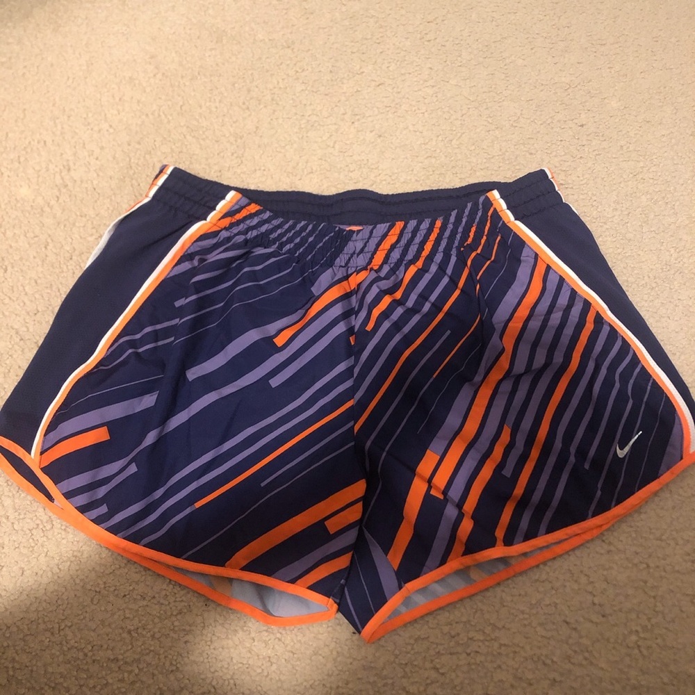 Nike Dri-Fit Running Shorts
Size: L
Multiple shades of purple/orange